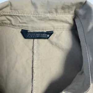 📌 TITLE Zara Khaki Tan Utility Drawstring Button Down Blouse Top XS thumbnail 16