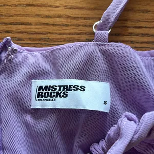 Mistress rocks purple dress thumbnail 2