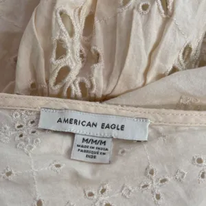 AE Cottagecore BOHO Eyelet Lace Ruffle Tiered Smocked Wrap Mini‎ Dress Size M thumbnail 5