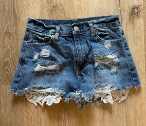Aeropostale Distressed Festival Jean Shorts with Lace Trim thumbnail 1