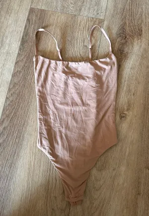 SKIMS Fits Everybody Thong Bodysuit thumbnail 1