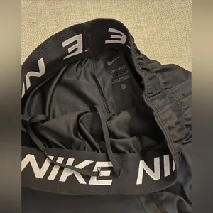 Nike women’s shorts with pockets. 4” Inseam. Black. thumbnail 2