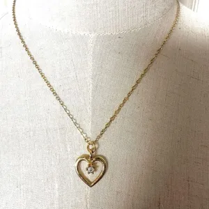 Gold tone heart rhinestone pendant necklace thumbnail 2
