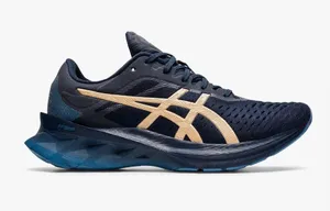 Asics navy and gold performance running sneaker thumbnail 1