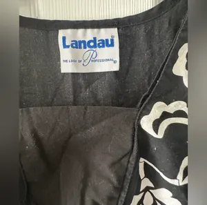 Landau short sleeve top is a size Medium. thumbnail 2