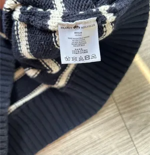 Classic oversized Brandy Melville "Brianna" striped sweater in navy blue and white. Super soft, chunky, and breathable knit made from 100% cotton. thumbnail 7