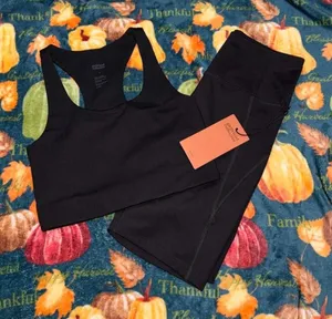 GIRLFRIEND COLLECTIVE Paloma Racerback Bra + High-Rise Bike Shorts Set — Black thumbnail 1