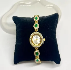Luxury women’s watch sparkly emerald green stone thumbnail 2