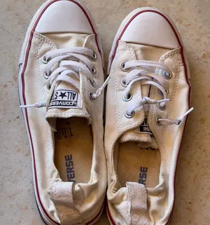 Cream Converse Slip-on Sneakers thumbnail 1
