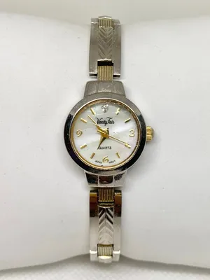 Vanity fair women’s watch silver gold tone 20mm mop dial quartz analog running thumbnail 1