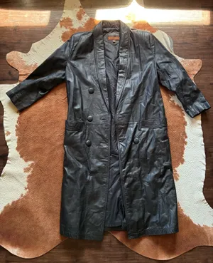 Vintage Black leather Rock Creek trench coat size small The outer shell is 100% genuine leather The lining in Nylon! Missing 1 button on the right side in pictures 1-4 not noticeable or even a snag there!!! thumbnail 1