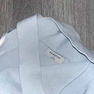 Aritzia Babaton Sculpt Knit Criss Cross Cropped Tank baby blue size small thumbnail 4