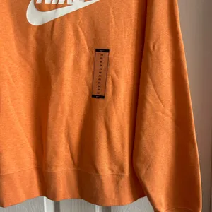 Nike Orange Pullover Sweatshirt with White Swoosh thumbnail 3