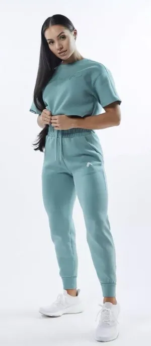 Set 2 Pcs Alphalete Women's ELMTS Short Sleeve Crop & Relaxed Coffed Jogger Teal thumbnail 1