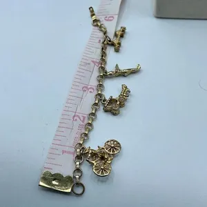 Vintage 6” charm bracelet. Gold tone with crossover clasp. thumbnail 7