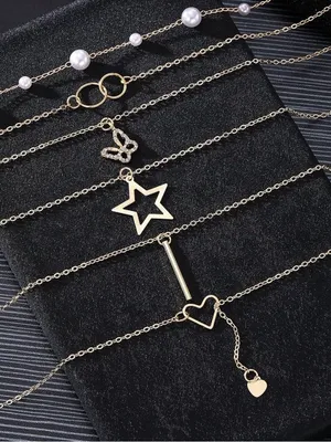 14K Gold Plated Multi-Layered Necklace with Star, Key, and Butterfly Charms thumbnail 6