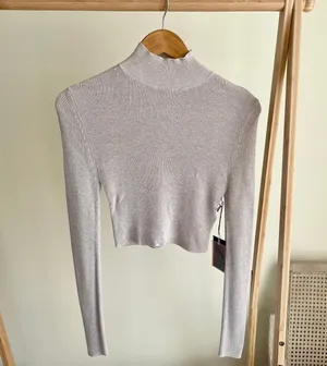 Cropped Ribbed Turtleneck Sweater in Oatmeal - S thumbnail 1