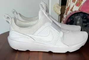 Nike White Slip-On Sneakers thumbnail 1