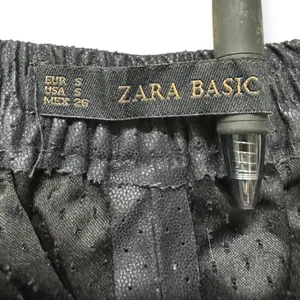 ZARA | S | Black Perforated Faux Leather Elastic Waist Pull-On Short Shorts thumbnail 2