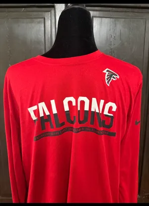 Nike NFL Falcons unisex longsleeves Dri-Fit t-shirt- size Large. Gently warn and excellent condition. Priced to sell at as is condition. Measurements approximately 20” from armpit to armpit x 26” long. Non-smoking home. Don’t like my price, make reasonable offer! And thank you for checking my closet. thumbnail 1
