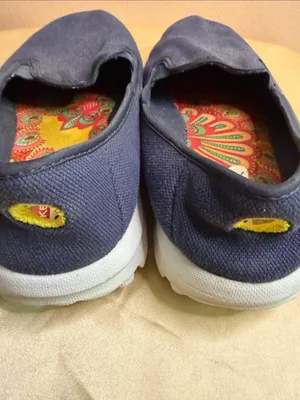 Skechers Kids Slip-On Sneakers in Navy with Yellow Liner thumbnail 4