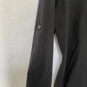 H&M women's Black Long-Sleeve‎ Henley Shirt With Button Tab Sleeves Size M thumbnail 4