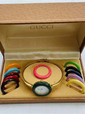 Gucci Gold Bangle Watch with beautiful bezels💛💙💚❤️💜🩵 thumbnail 1