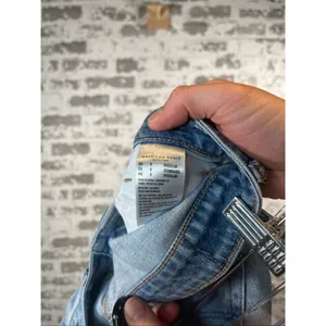 American Eagle | women mom jean distressed denim thumbnail 2