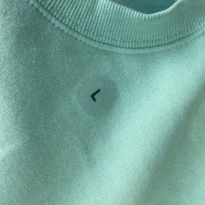 HELLO KITTY Large NWT Pink Teal Bunny Easter Pullover Sweatshirt Cute‎ Kawaii thumbnail 2