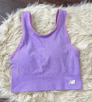 NWOT purple New Balance seamless cropped sports bra Size M thumbnail 1