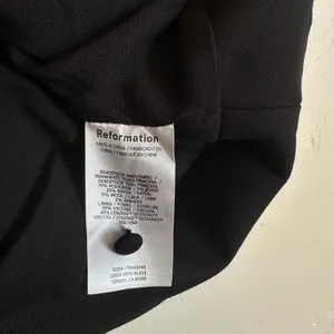 Reformation | Auli Halter Wool-Blend Peplum Vest Top in Black | size 2 thumbnail 8
