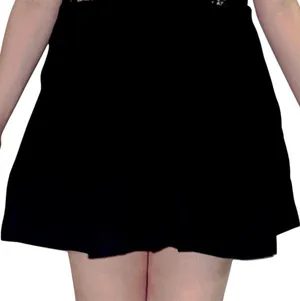 black pleated mini skort. thumbnail 1