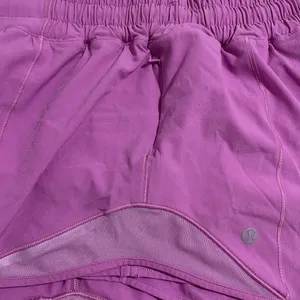 Lululemon • magenta glow hotty hot shorts sz 12 thumbnail 11