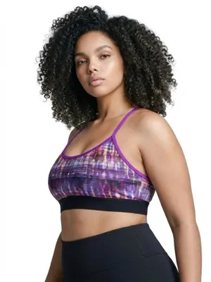 Alo Yoga racerback Spark sports bra featuring a purple abstract print thumbnail 9