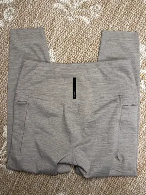 Reebok women’s tan Athletic Leggings with side pockets thumbnail 3
