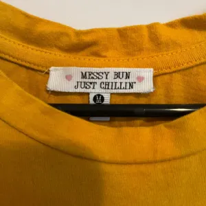 Marshall’s mustard yellow T shirt. thumbnail 4
