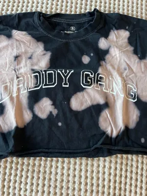 Barstool Daddy Gang black crop tee with bleached tie-dye detailing. Soft cotton feel and bold varsity-style logo. Stylish, easy-to-wear top for everyday play and layering. thumbnail 2
