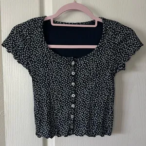 Brandy Melville Navy Floral Zelly Top thumbnail 1