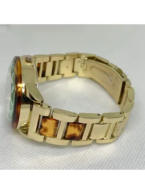 Gold tone tortoiseshell style women watch 38mm quartz analog up to 7.5” running thumbnail 6