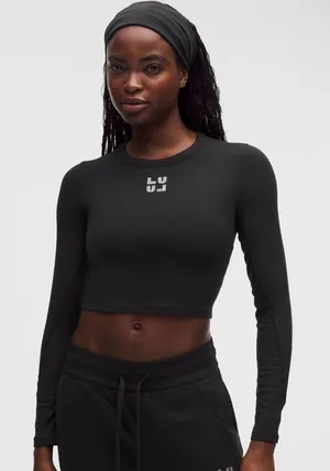 Lululemon Size 6 Hold Tight Long Sleeve in Black thumbnail 1