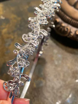 Silver metal headband with flowers and rhinestones on a vine thumbnail 8