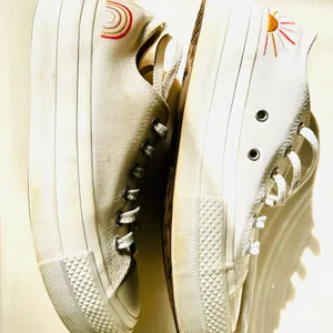 Ivory Converse sneakers with vibrant sun & rainbow side embroidery. thumbnail 5