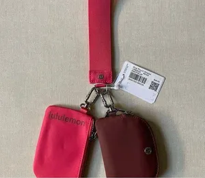 Lululemon Dual Pouch Wristlet - Ancient Copper/Glaze Pink thumbnail 1