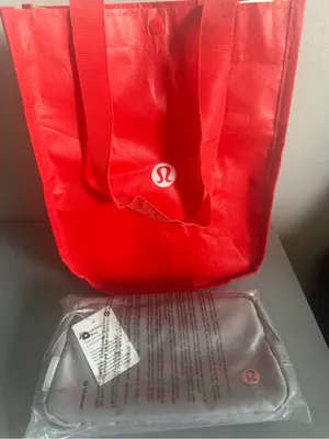 lululemon light grey travel pouch with red packing sleeve thumbnail 7
