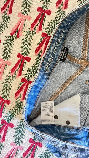 American Eagle blue denim shorts with bandana print pocket, Size 0. thumbnail 2