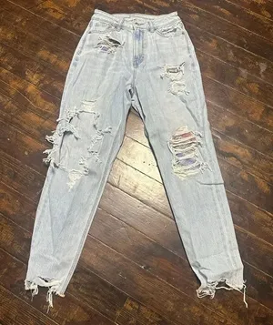 American Eagle Mom destroyed light wash relaxed jeans thumbnail 1