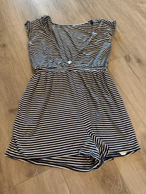 Urban Outfitters Striped Romper - Excellent Condition - Women’s Size M Description: Upgrade your casual wardrobe with this effortless Urban Outfitters striped knit romper! Made in the USA, this stylish piece features a classic navy and white nautical stripe pattern with a flattering deep V-neckline, soft cap sleeves, and a comfortable cinched elastic waistband. Crafted from a soft, lightweight stretch fabric, it’s perfect for summer outings, beach cover-ups, or casual weekend wear. Brand: Urban Outfitters Size: Women’s Medium (M) Condition: Excellent, like-new condition with no visible flaws, stains, or excessive wear. Details: Elasticized waist, short inseam, breathable stretch material, made in USA. Fast shipping from a smoke-free home! Feel free to drop a comment with any questions or send reasonable offers. thumbnail 2