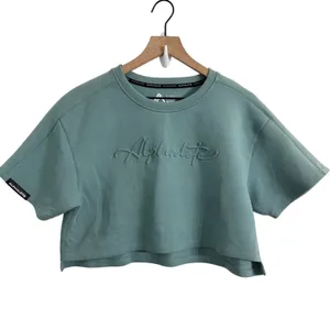 Alphalete Woman’s ELMTS Short Sleeve Crop Top Teal Blue Size Small thumbnail 2