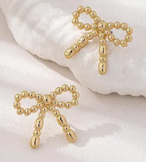 Chic Gold Bow Earrings thumbnail 1