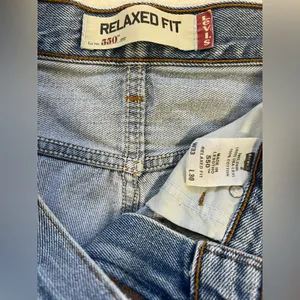 Levi’s Relaxed Fit Light Blue Denim Cutoff Shorts thumbnail 4